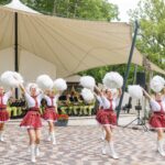 Babtų kultūros centro dūdų orkestras „Algupys“ ir grakščiosios šokėjos