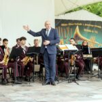 Šakių pučiamųjų instrumentų orkestras, vadovaujamas Ugniaus Arcabo